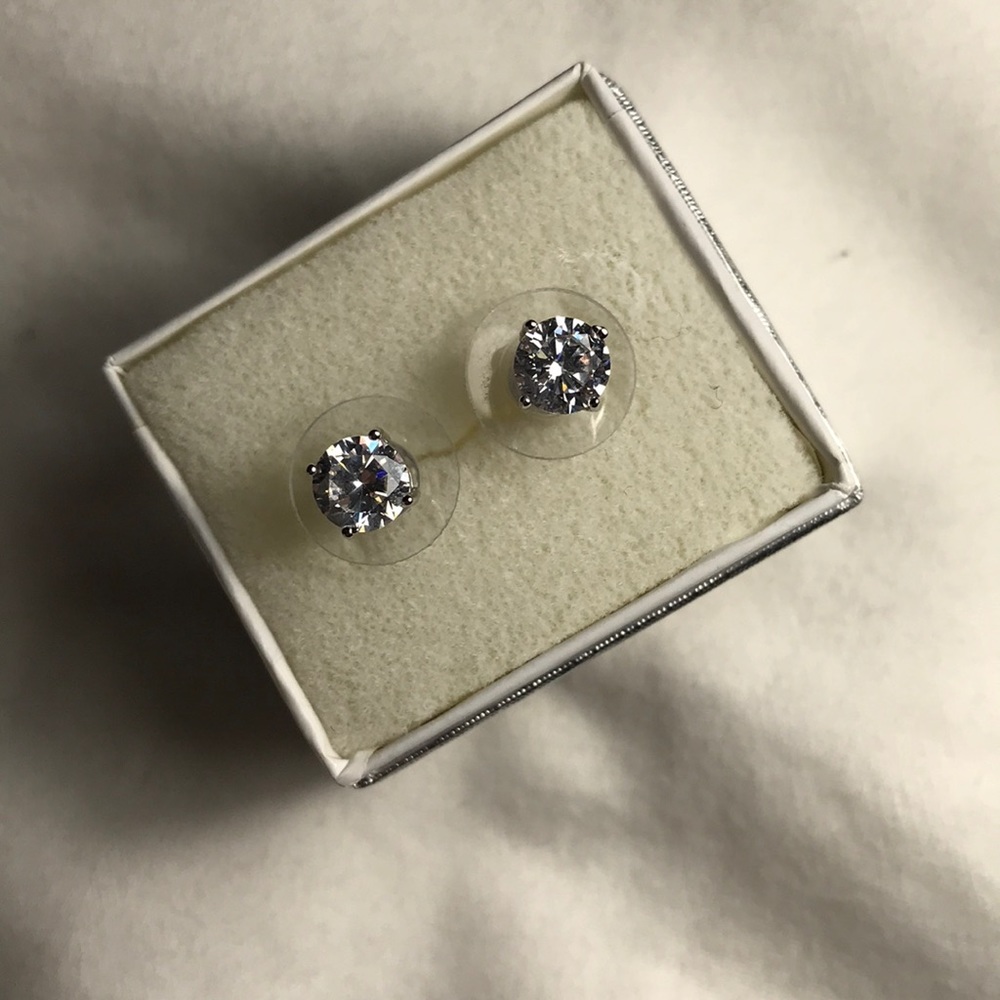 Brand new zirconia stud sterling silver earrings
